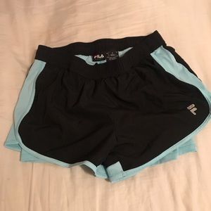 Woman’s Fila brand black and blue shorts